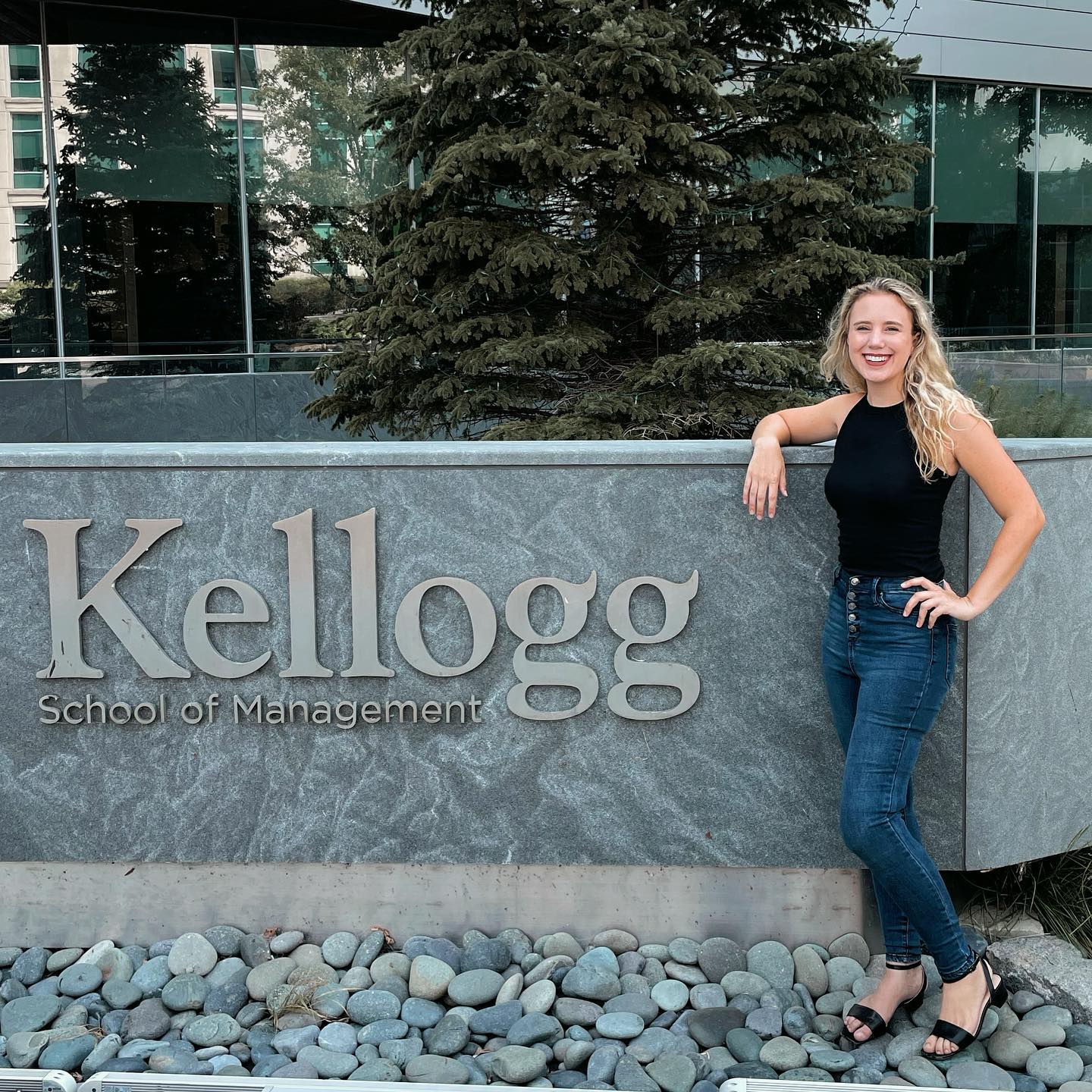 Ashley at the Northwestern Kellogg School of Management sign